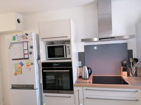 Kitchen or kitchenette, oven, stove, toaster