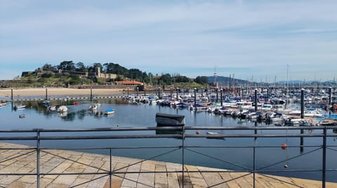 Nearby landmark, Day, Natural landscape, Beach, City view