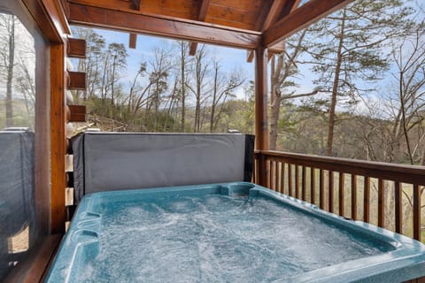 Sharp Dressed Bear is an Amenity Packed 4 Bedroom Cabin with Beautiful Views of The Smoky Mountains! House in Pigeon Forge