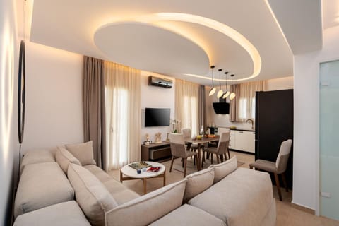 TV and multimedia, Living room, Seating area, Dining area, furniture, air conditioner