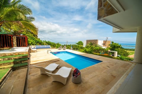 Day, Natural landscape, Pool view, Sea view, Swimming pool, sunbed