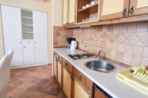 Kitchen or kitchenette, stove