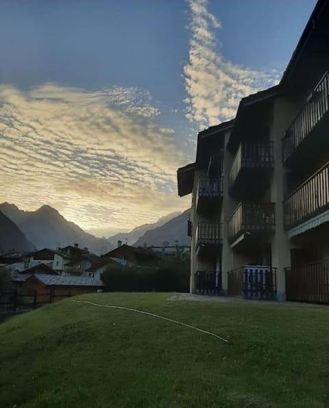 Property building, Natural landscape, Mountain view, Sunset