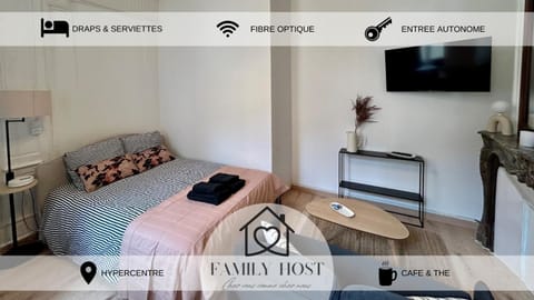 Bed, Property logo or sign, Living room