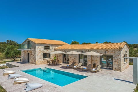 Property building, Patio, Day, Pool view, Swimming pool