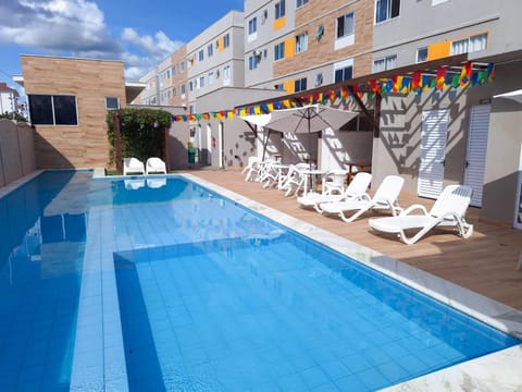 Property building, Day, Pool view, Swimming pool, sunbed