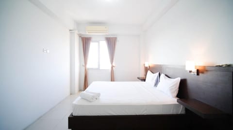 Simple 2BR with Extra Bed at Menara Rungkut Apartment By Travelio Apartment in Surabaya