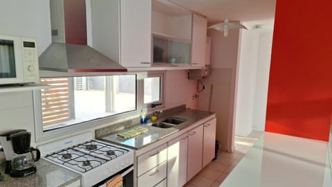 Kitchen or kitchenette, oven