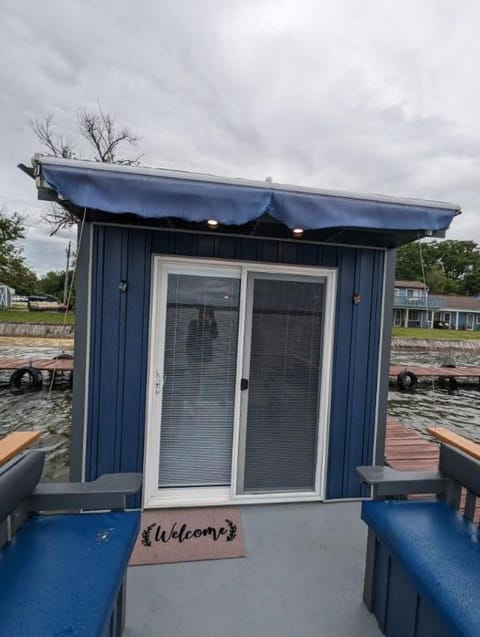 House boat on Fife Lake Docked boat in Fife Lake