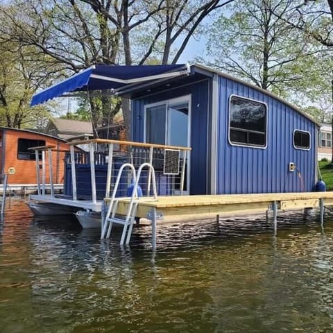 House boat on Fife Lake Docked boat in Fife Lake