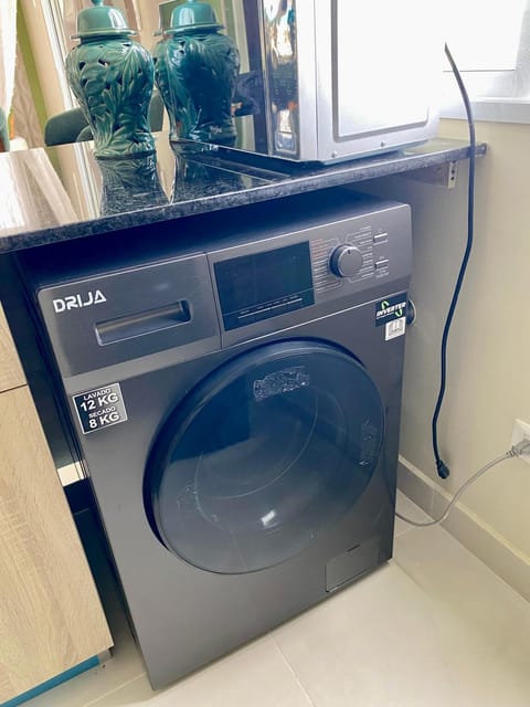 Kitchen or kitchenette, washing machine, dryer