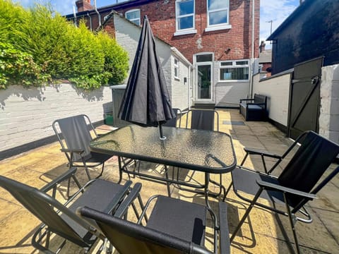 Property building, Garden, Seating area, Dining area