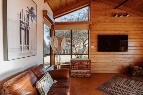 Living room, Seating area, Garden view, fireplace