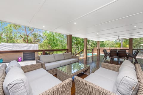 Patio, Balcony/Terrace, Living room, Seating area, Pool view