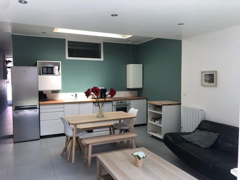 Dining area, dishwasher, microwave, oven, stove, toaster
