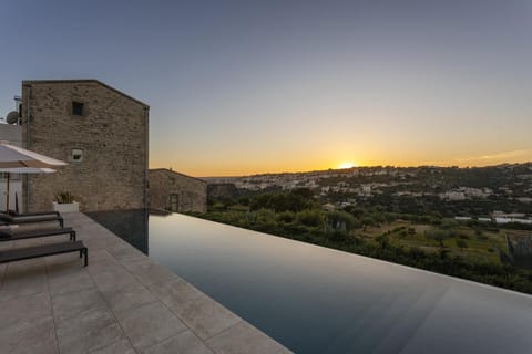 Natural landscape, View (from property/room), Pool view, Swimming pool, Sunset, sunbed