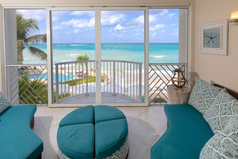 View (from property/room), Balcony/Terrace, Seating area, Beach, Sea view