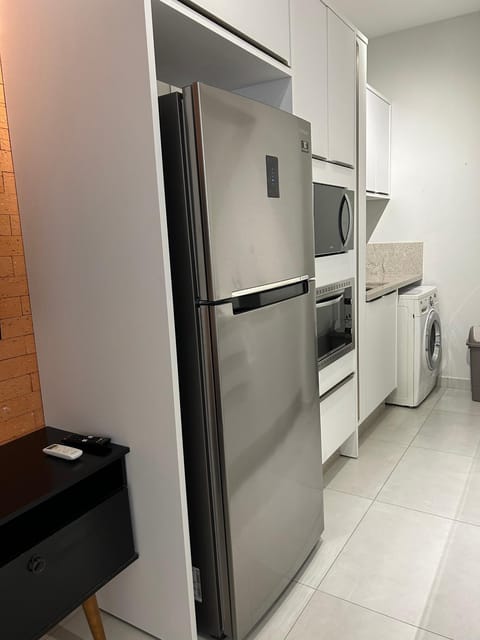 Kitchen or kitchenette, microwave, minibar, oven, washing machine, dryer