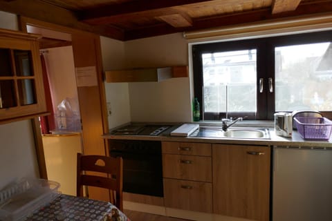 Kitchen or kitchenette, oven, stove