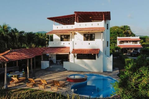 Property building, Garden, Pool view, sunbed