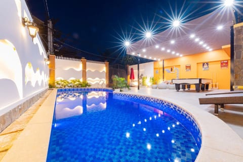 Patio, Night, Pool view, Swimming pool, sunbed