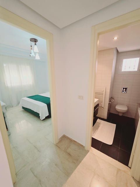 Toilet, Bed, Bathroom, Photo of the whole room, Bedroom, towels