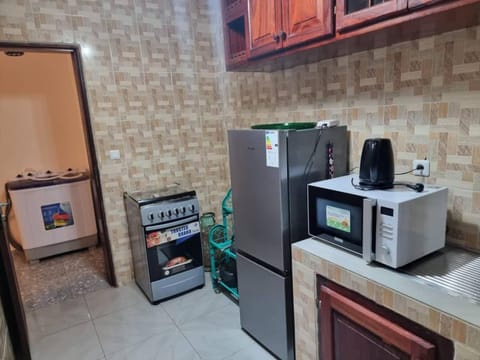 Kitchen or kitchenette, oven, stove