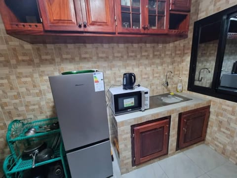 Kitchen or kitchenette, oven