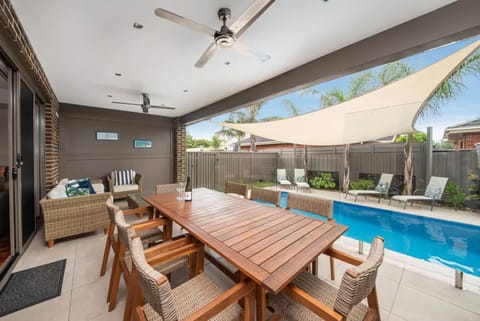 Patio, Seating area, Dining area, Pool view, Swimming pool, sunbed