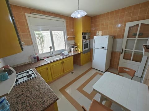 Kitchen or kitchenette, oven, stove