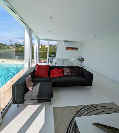 Patio, Living room, Seating area, Pool view