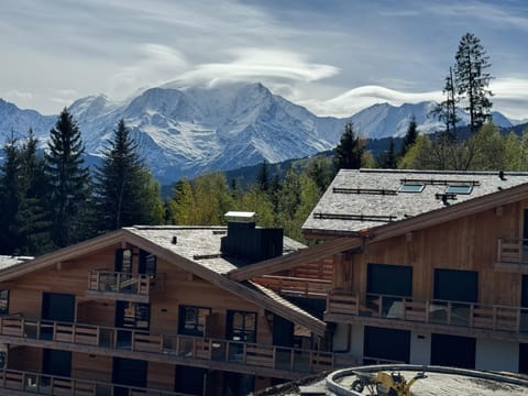 Property building, Nearby landmark, Natural landscape, Mountain view