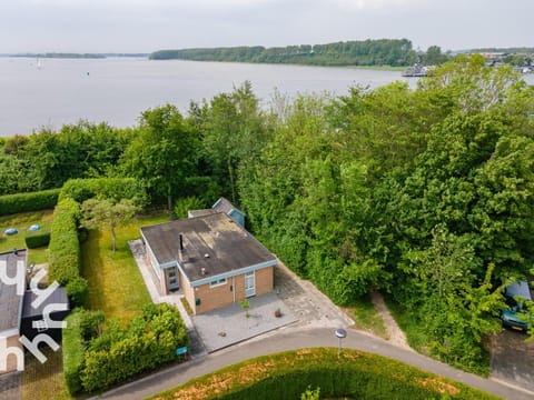 Property building, Day, Neighbourhood, Natural landscape, Bird's eye view, Lake view