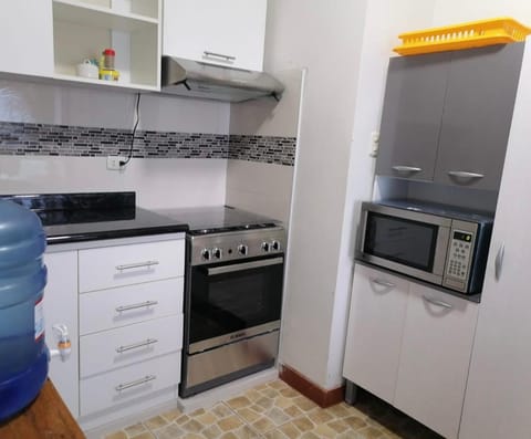 Kitchen or kitchenette, oven, stove, toaster