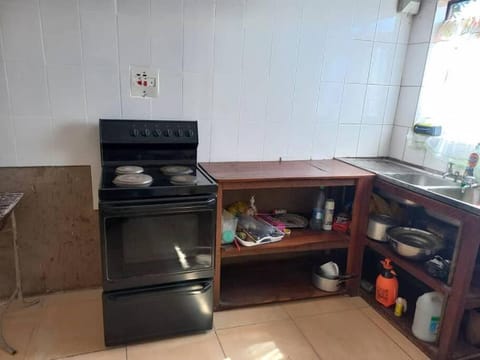 Kitchen or kitchenette, oven, stove