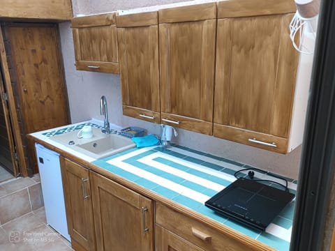 Kitchen or kitchenette, stove