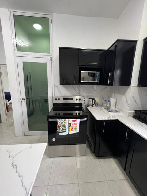 Kitchen or kitchenette, oven, stove