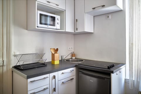 Kitchen or kitchenette, stove