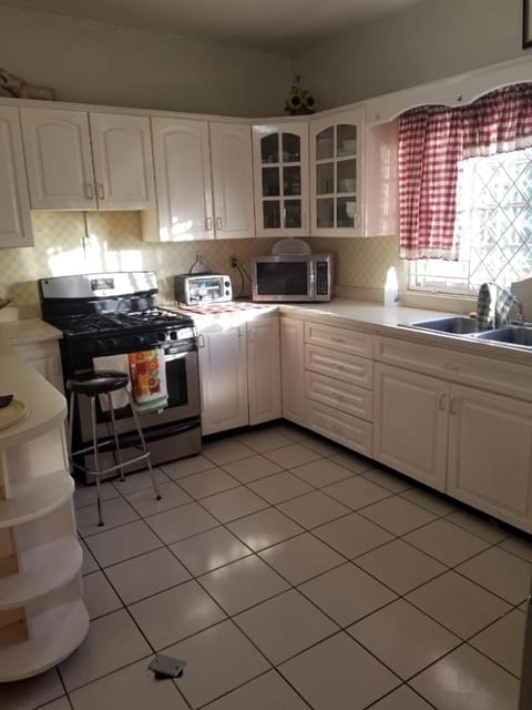 Kitchen or kitchenette, microwave, oven, stove, toaster