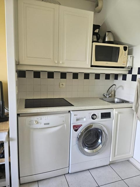 Bathroom, microwave, oven, washing machine, kitchen