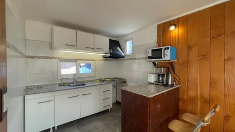 Kitchen or kitchenette, stove, toaster