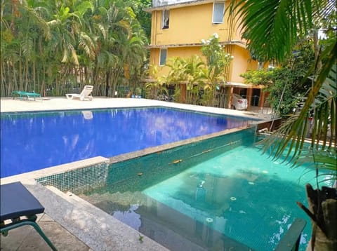 Sandy Toes 1 bhk with pool 2 mins to beach Apartment in Benaulim