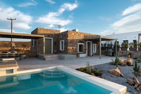 Property building, Patio, Natural landscape, Swimming pool, sunbed