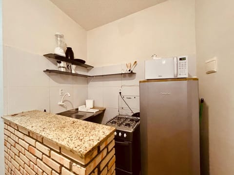 Kitchen or kitchenette, oven, stove