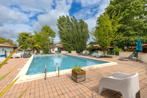 Property building, Living room, Swimming pool