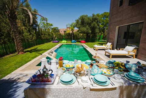 Patio, Day, Dining area, Food, Pool view, sunbed