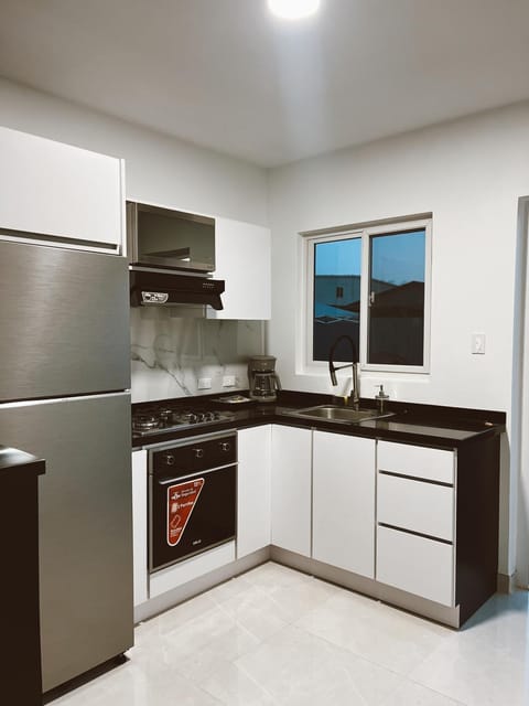 Kitchen or kitchenette, oven, stove