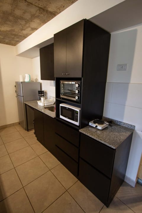 Kitchen or kitchenette, oven, stove