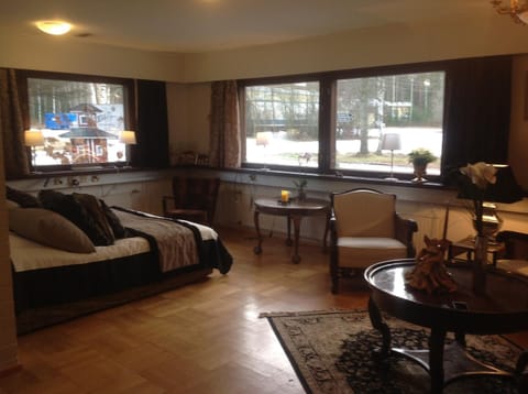 Bed, Living room, Seating area