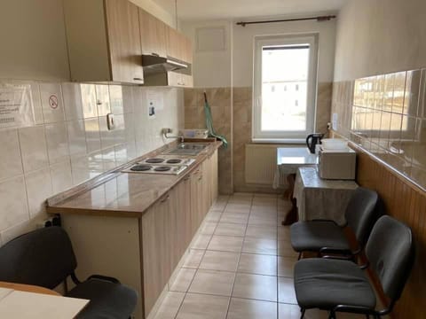 Kitchen or kitchenette, Seating area, Dining area, stove